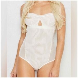 We are HAH Under the Wire Mesh Bodysuit in Walking on Eggshells
